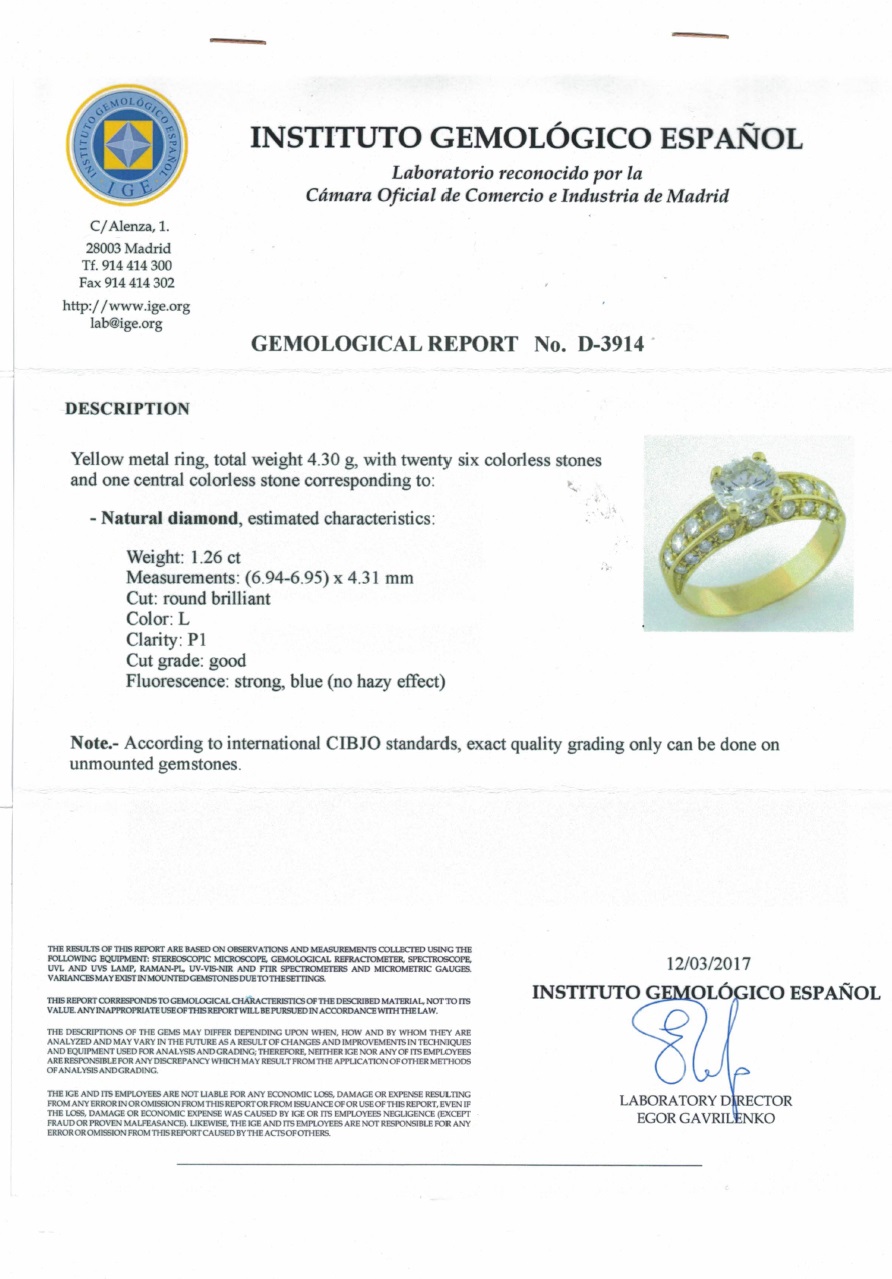 Sortija Certificada en Oro de 18k. con Diamante Talla Brillante de 1.26 ct. (L-P1) y 26 Brillantes de 0,90 ct. aprox. Sortija Certificada en Oro de 18k. con Diamante Talla Brillante de 1.26 ct. (L-P1) y 26 Brillantes de 0,90 ct. aprox.
