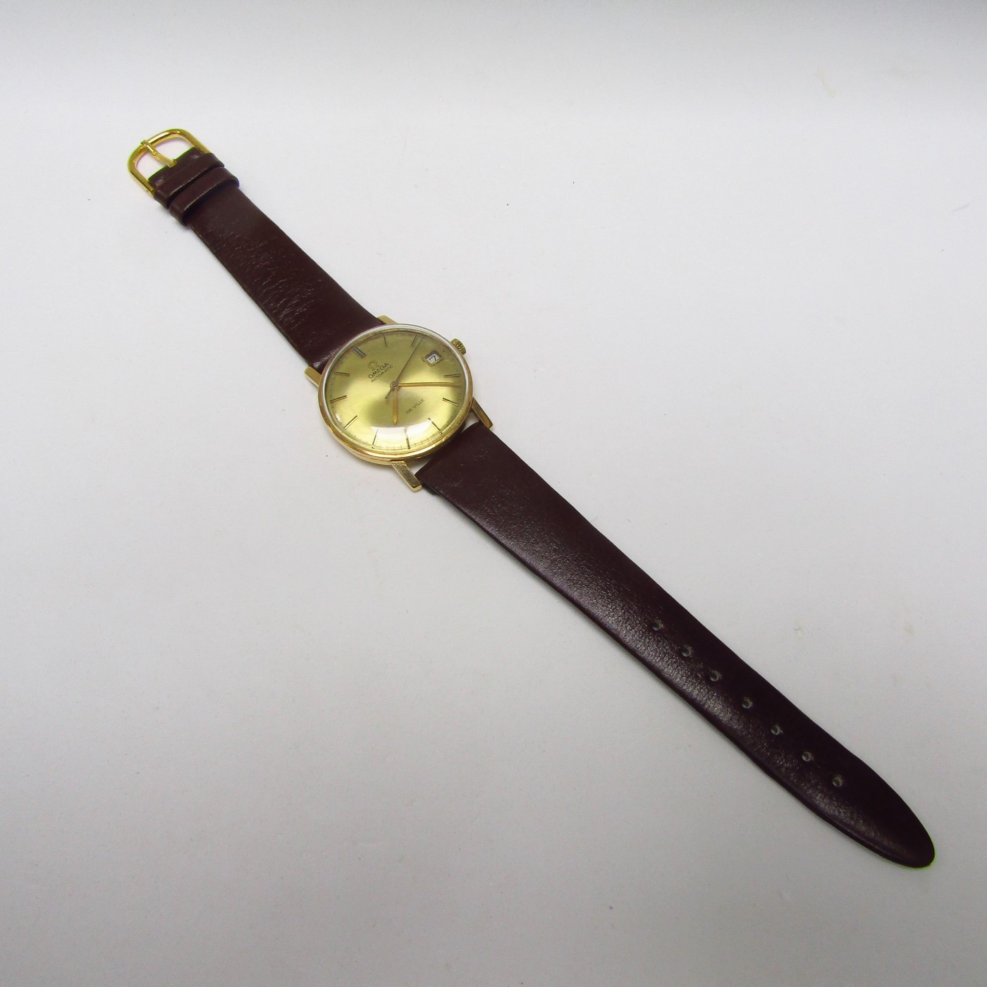 OMEGA AUTOMATIC DE VILLE. Reloj AUTOMÁTICO de pulsera para caballero.Oro 18k. Suiza, 1964. OMEGA AUTOMATIC DE VILLE. Reloj AUTOMÁTICO de pulsera para caballero.Oro 18k. Suiza, 1964.