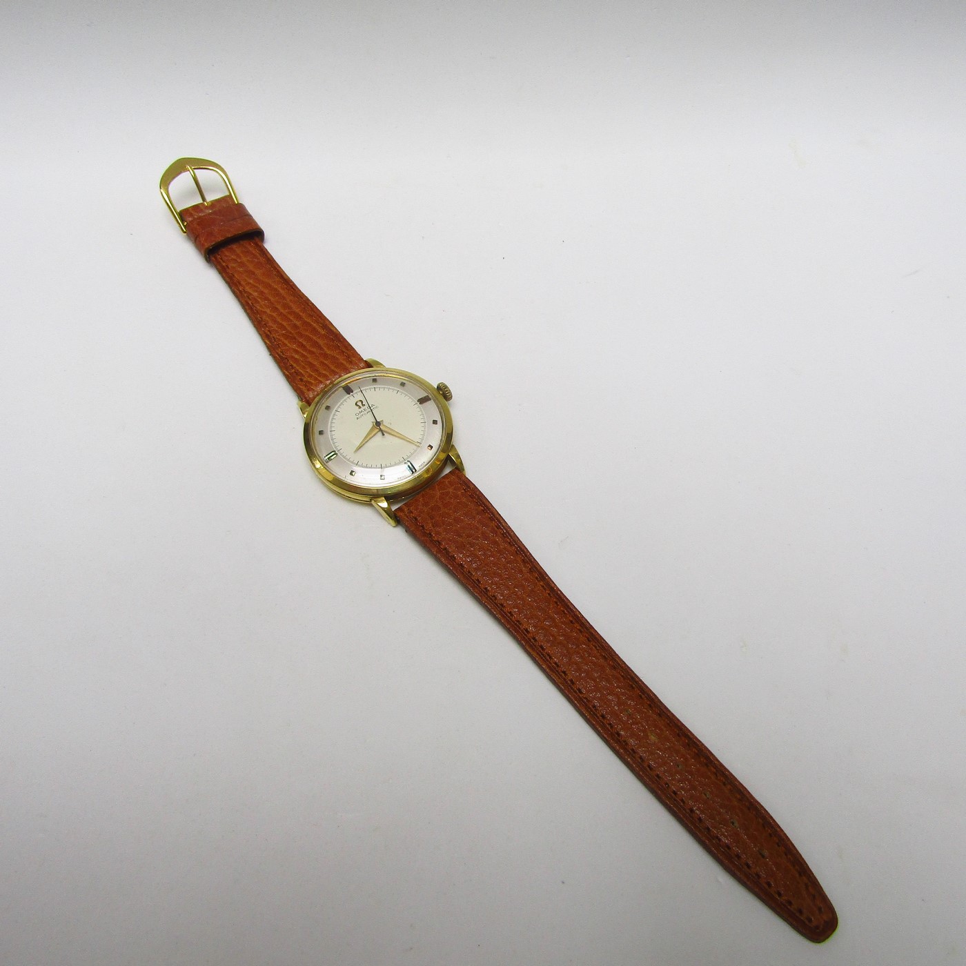 OMEGA AUTOMATIC. Reloj AUTOMÁTICO de pulsera para caballero.Oro 18k. Suiza, 1950. OMEGA AUTOMATIC. Reloj AUTOMÁTICO de pulsera para caballero.Oro 18k. Suiza, 1950.